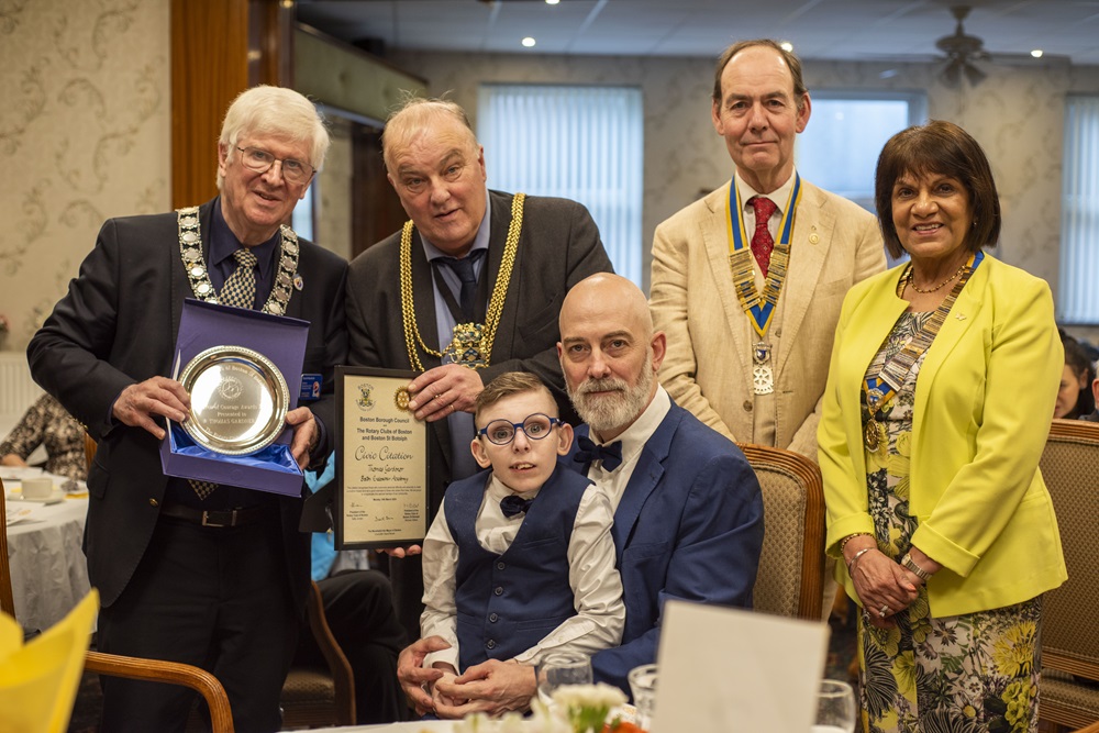 Thomas with his dad and the Mayor and members of the Rotary Club