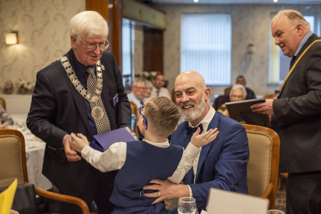 Thomas pictured with his dad and Rotarian, David Kendrick
